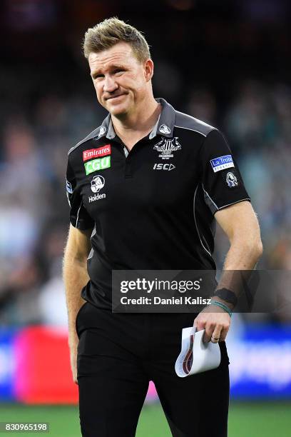 Magpies head coach Nathan Buckley walks from the field during the round 21 AFL match between Port Adelaide Power and the Collingwood Magpies at...