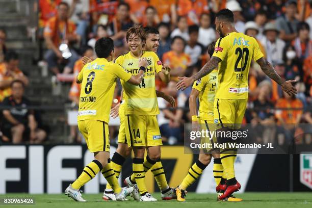 Junya Ito of Kashiwa Reysol celebrates scoring the opening goal with his team mates during the J.League J1 match between Shimizu S-Pulse and Kashiwa...