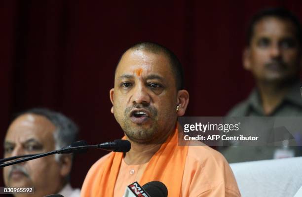 Chief Minister of Uttar Pradesh , Yogi Adityanath speaks during a press confrence after visiting the Baba Raghav Das Hospital in Gorakhpur, in the...