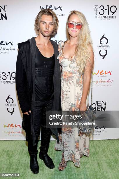 Jason John and Georgia Shannon attend Chaz Dean summer party benefiting Love Is Louder on August 12, 2017 in Los Angeles, California.