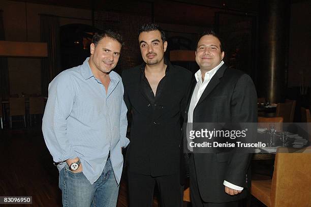 Andrew Sasson, Mohammed Ali Al Hashimi and Andy Masi attend the grand opening celebration of Yellowtail Sushi Restaurant & Bar At Bellagio Hotel and...
