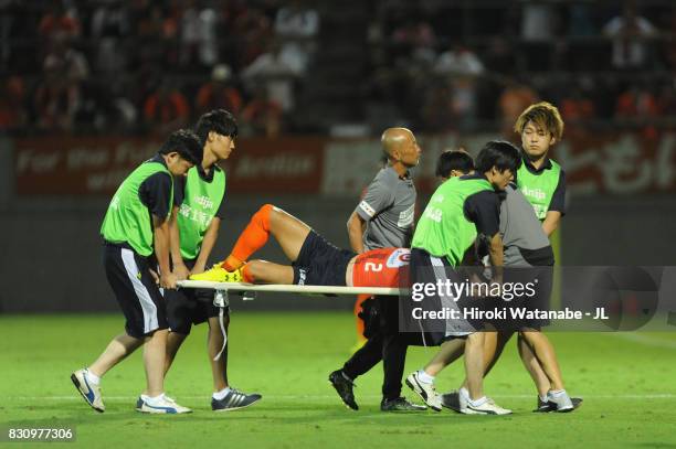 Kosuke Kikuchi of Omiya Ardija is taken off by a stretcher during the J.League J1 match between Omiya Ardija and Albirex Niigata at NACK 5 Stadium...