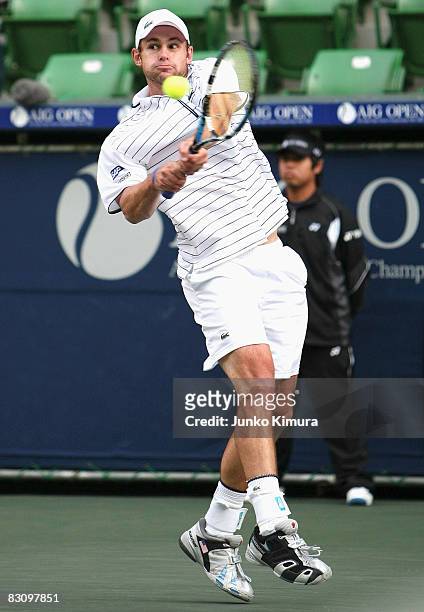 Andy Roddick of the US returns a shot to Viktor Troicki of Serbia on day five of the AIG Japan Open Tennis Championship 2008 at Ariake Colosseum on...