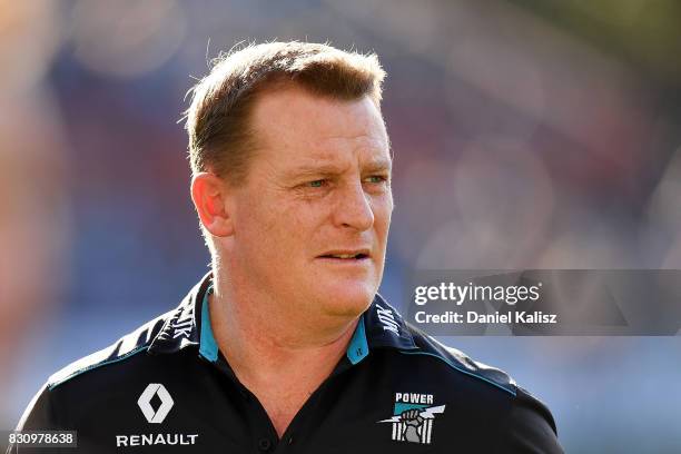 Michael Voss midfield manager of the Power looks on during the round 21 AFL match between Port Adelaide Power and the Collingwood Magpies at Adelaide...