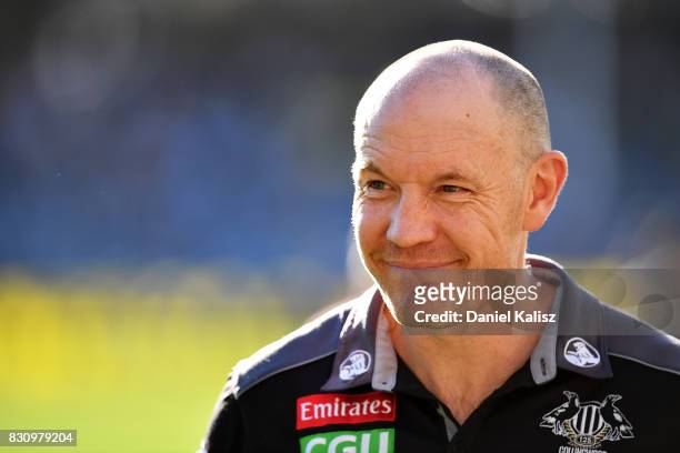 Magpies assistant coach Brenton Sanderson looks on during the round 21 AFL match between Port Adelaide Power and the Collingwood Magpies at Adelaide...