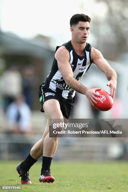 Jack Blair of Collingwood kicks during the round 16 VFL match between the Collingwood Magpies and North Ballarat at Victoria Park on August 13, 2017...