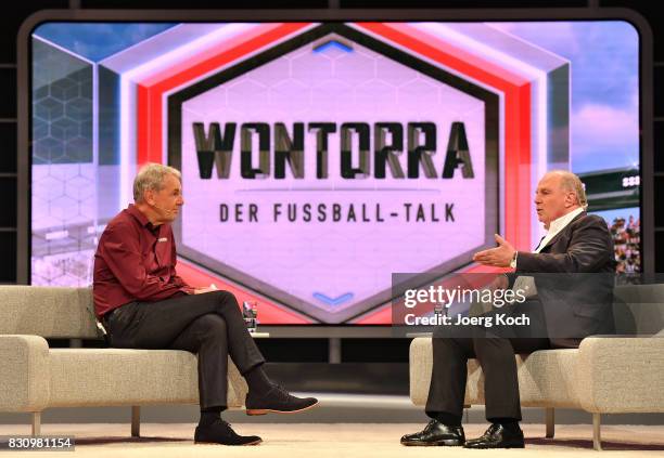 Joerg Wontorra talks to Uli Hoeness during the first airing of the new talk show 'Joerg Wontorra und Gaeste' on August 13, 2017 in Munich, Germany.
