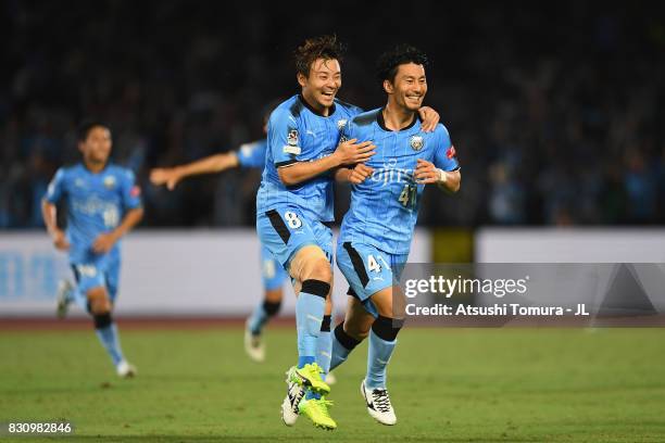 Akihiro Ienaga of Kawasaki Frontale scores his side's third goal with his team mate Hiroyuki Abe during the J.League J1 match between Kawasaki...