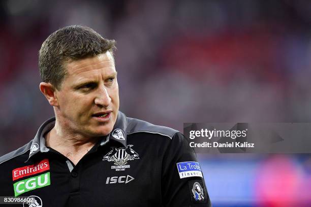 Magpies midfield coach Scott Burns looks on during the round 21 AFL match between Port Adelaide Power and the Collingwood Magpies at Adelaide Oval on...