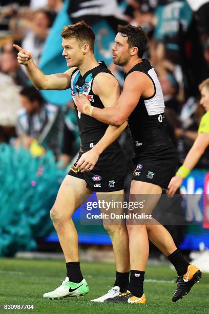 Robbie Gray of the Power celebrates after kicking a goal with Travis Boak of the Power during the round 21 AFL match between Port Adelaide Power and...