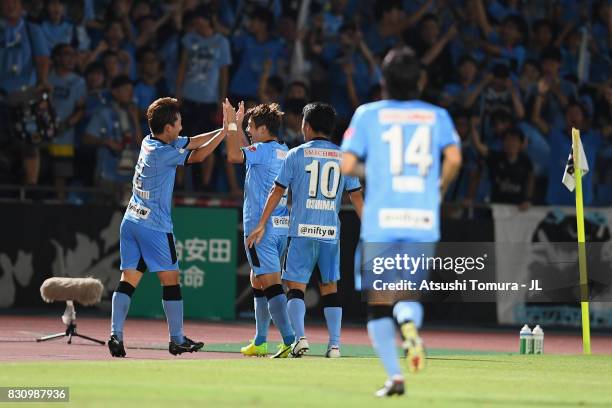 Hiroyuki Abe of Kawasaki Frontale celebrates scoring his side's second goal with his team mates during the J.League J1 match between Kawasaki...