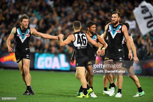 Sam Gray of the Power celebrates after kicking a goal during the round 21 AFL match between Port Adelaide Power and the Collingwood Magpies at...