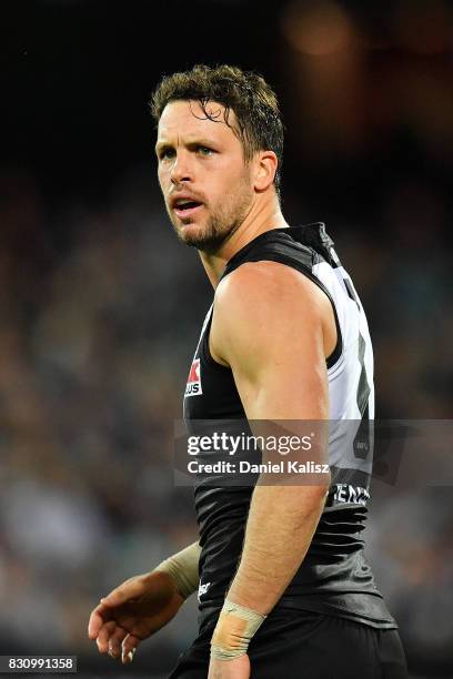 Travis Boak of the Power looks on during the round 21 AFL match between Port Adelaide Power and the Collingwood Magpies at Adelaide Oval on August...