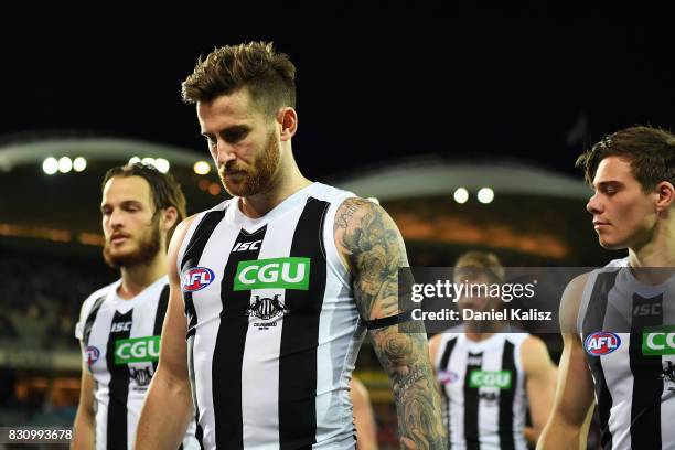 Jeremy Howe of the Magpies walks from the field looking dejected after being defeated by the Power during the round 21 AFL match between Port...