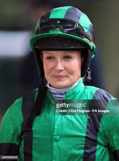 Joanna Mason makes her way into the parade ring before the Betfred Haydock Park Ladies' Trophy Handicap Stakes during Betfred Rose of Lancaster...