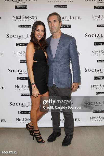 Christine Montanti and Justin Mitchell attend the Social Life Magazine Nest Seekers August Issue Party on August 12, 2017 in Southampton, New York.