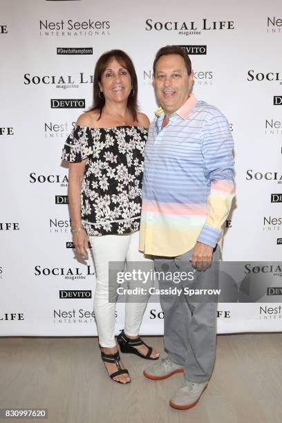 Sherri Singer and Arthur Singer attend the Social Life Magazine Nest Seekers August Issue Party on August 12, 2017 in Southampton, New York.