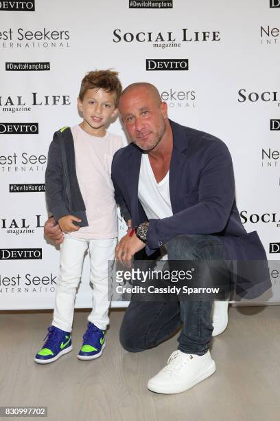 Mitch Kogen and his son attend the Social Life Magazine Nest Seekers August Issue Party on August 12, 2017 in Southampton, New York.