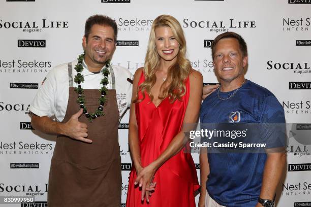 James Aptakin, Beth Stern and Michael Gotowala attend the Social Life Magazine Nest Seekers August Issue Party on August 12, 2017 in Southampton, New...