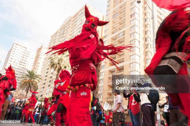 masked "los diablos rojos" "the red devils" - yellow song 2013 stock pictures, royalty-free photos & images