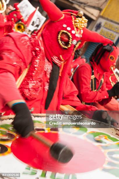 masked "los diablos rojos" "the red devils" - yellow song 2013 stock pictures, royalty-free photos & images