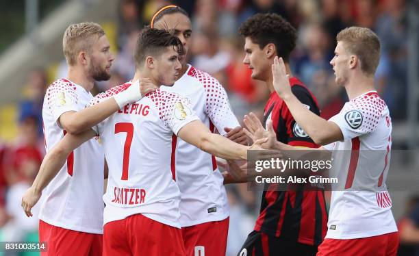 Marcel Sabitzer of Leipzig celebrates his team's first goal with team mates during the DFB Cup first round match between Sportfreunde Dorfmerkingen...