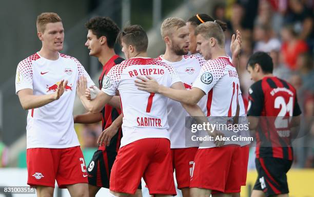 Marcel Sabitzer of Leipzig celebrates his team's first goal with team mates during the DFB Cup first round match between Sportfreunde Dorfmerkingen...