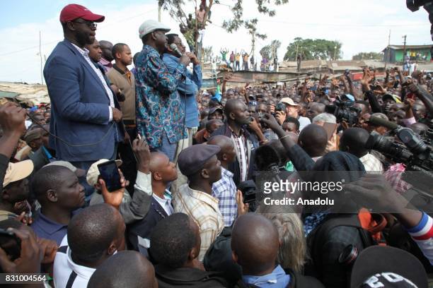 Kenya's opposition leader Raila Odinga addresses his supporters in the Kibera district of Nairobi on August 13, 2017.