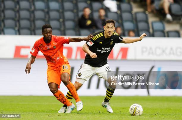 Abdul Razak of Athletic FC Eskilstuna and Stefan Ishizaki of AIK competes for the ball during the Allsvenskan match between AIK and Athletic FC...