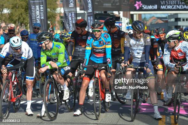 Alexander Kristoff , Green Jersey - August Jensen , Blue-Orange Leader Jersey - Dylan Teuns , a rider from Aqua Blue Sport Team and Bernhard Eisel ,...