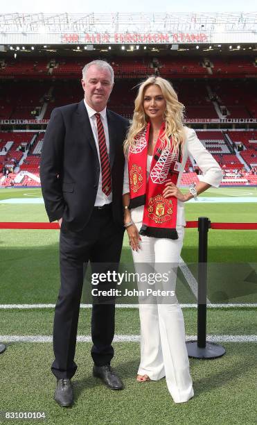 Former player Gary Pallister of Manchester United poses with World Cup Russia 2018 ambassador and former Miss Russia Victoria Lopyreva ahead of the...