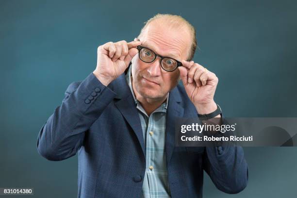 English comedian, actor, writer, musician, television presenter and director Ade Edmondson attends a photocall during the annual Edinburgh...