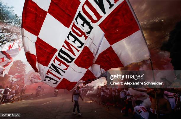 Fans of Sao Paulo welcome the bus of the players before the match between Sao Paulo and Cruzeiro for the Brasileirao Series A 2017 at Morumbi Stadium...