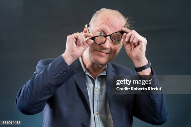 English comedian, actor, writer, musician, television presenter and director Ade Edmondson attends a photocall during the annual Edinburgh...