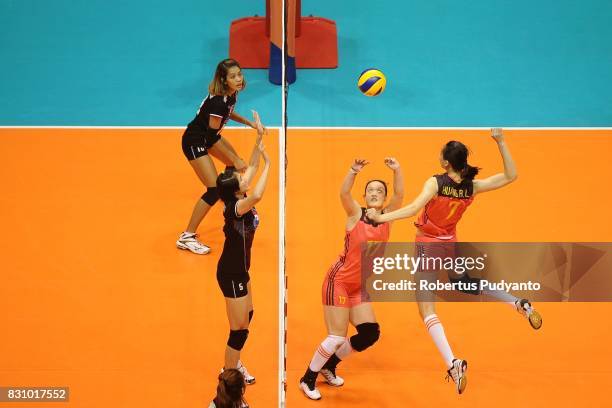 Rui Lei Huang of China spikes during the 19th Asian Senior Women's Volleyball Championship 2017 Classification match between Thailand and China at...