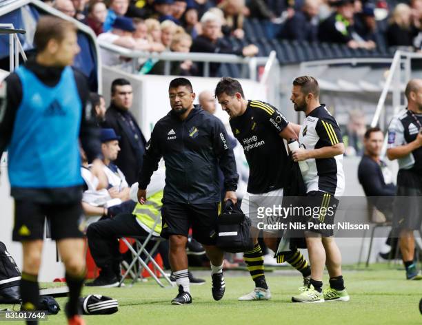 Stefan Ishizaki of AIK injured during the Allsvenskan match between AIK and Athletic FC Eskilstura at Friends arena on August 13, 2017 in Solna,...