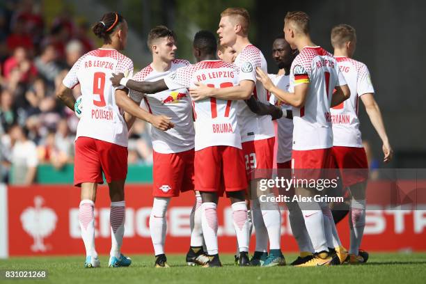 Marcel Sabitzer of Leipzig celebrates his team's second goal with team mates during the DFB Cup first round match between Sportfreunde Dorfmerkingen...