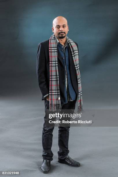 Indian poet, playwright and performer Siddhartha Bose attends a photocall during the annual Edinburgh International Book Festival at Charlotte Square...