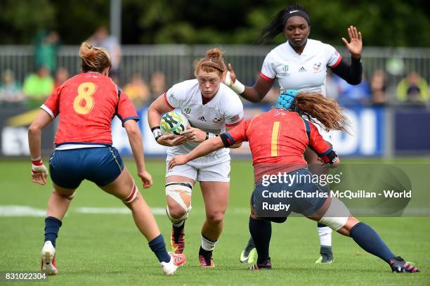 Alev Kelter of The USA is tackled by Isabel Rico of Spain during the Women's Rugby World Cup 2017 match between USA and Spain on August 13, 2017 in...