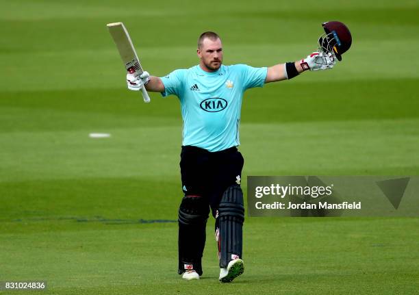 Aaron Finch of Surrey celebrates his century during the NatWest T20 Blast match between Surrey and Sussex Shark at The Kia Oval on August 13, 2017 in...