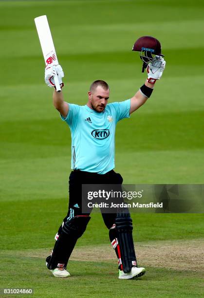 Aaron Finch of Surrey celebrates his century during the NatWest T20 Blast match between Surrey and Sussex Shark at The Kia Oval on August 13, 2017 in...