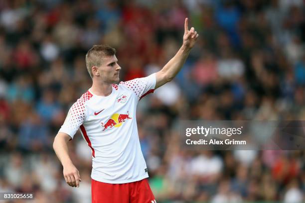 Timo Werner of Leipzig celebrates his team's third goal during the DFB Cup first round match between Sportfreunde Dorfmerkingen and RB Leipzig at...