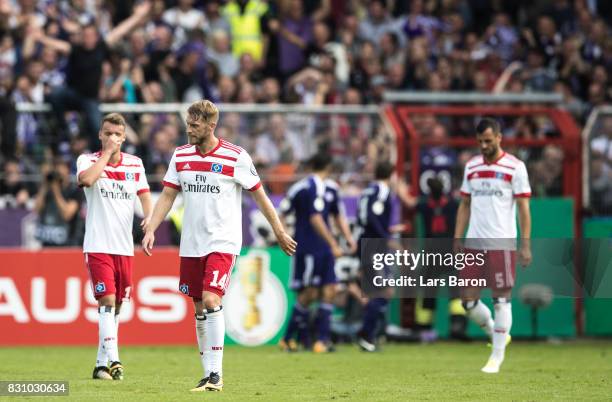 Aaron Hunt of Hamburg looks dejected after the third goal for Osnabrueck during the DFB Cup match between VfL Osnabrueck and Hamburger SV at Osnatel...
