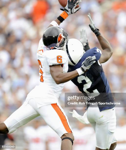 Keenan Lewis of the Oregon State Beavers knocks the ball from Derrick Williams of the Penn State Nittany Lions at Beaver Stadium on September 6, 2008...