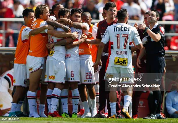 Hernanes of Sao Paulo celebrates their thirth goal with his team mates during the match between Sao Paulo and Cruzeiro for the Brasileirao Series A...