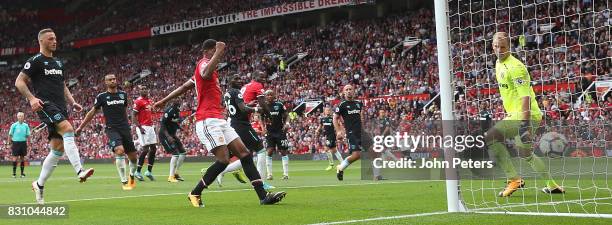 Romelu Lukaku of Manchester United scores their second goalduring the Premier League match between Manchester United and West Ham United at Old...