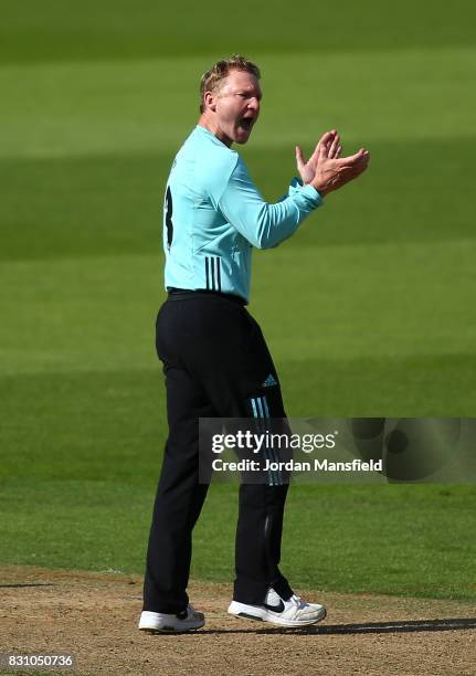 Gareth Batty of Surrey celebrates dismissing Chris Nash of Sussex during the NatWest T20 Blast match between Surrey and Sussex Shark at The Kia Oval...