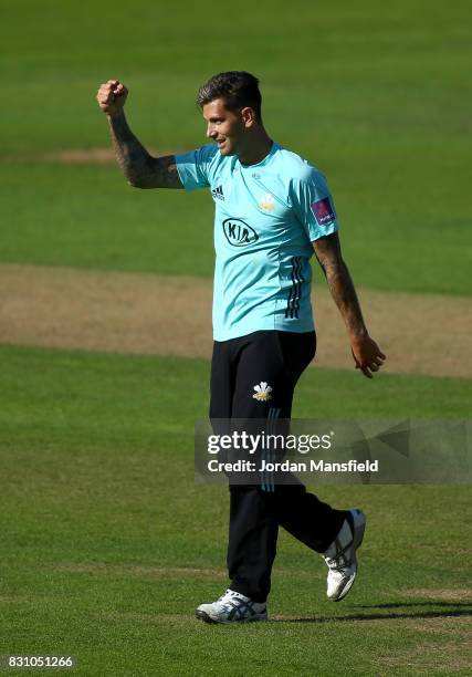 Jade Dernbach of Surrey celebrates dismissing Ben Brown of Sussex during the NatWest T20 Blast match between Surrey and Sussex Shark at The Kia Oval...
