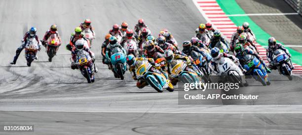 Moto3 riders start the race during Austrian Grand Prix race at Red Bull Ring in Spielberg, Austria on August 13, 2017. / AFP PHOTO / Jure Makovec