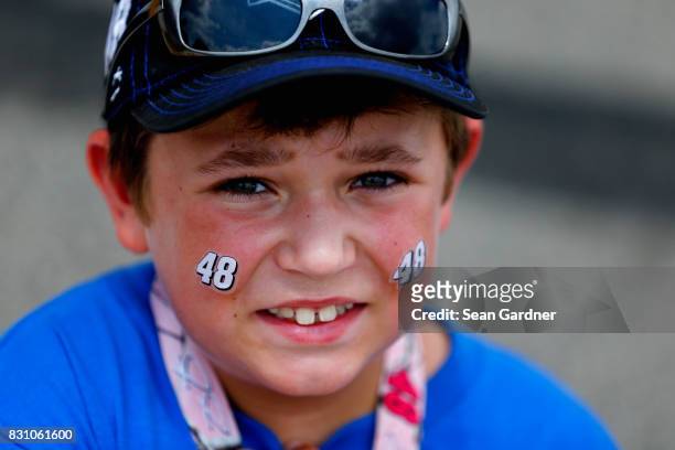 Young fan of Jimmie Johnson, driver of the Lowe's/Jimmie Johnson Foundation Chevrolet, is seen prior to the Monster Energy NASCAR Cup Series Pure...